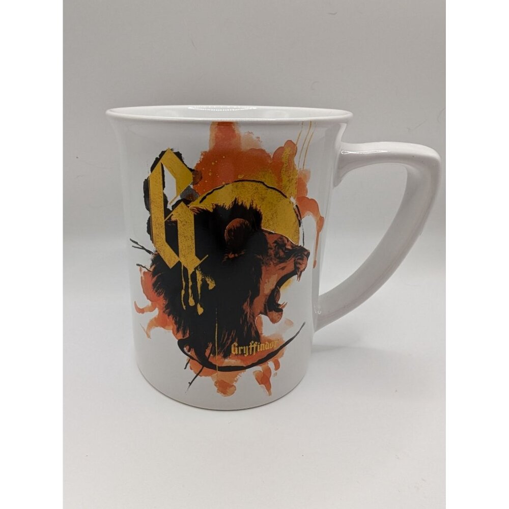 Harry Potter x Enesco G Mug Gryffindor roaring lion white & orange 4 1/2 in